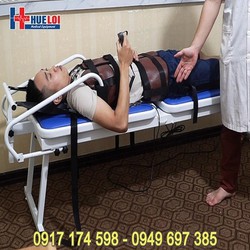 Máy giường kéo giãn điều trị thoát vị đĩa đệm bằng...